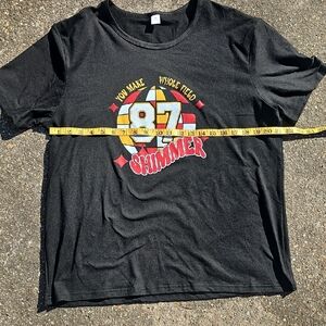 Graphic Black T-Shirt with Red and Yellow Design